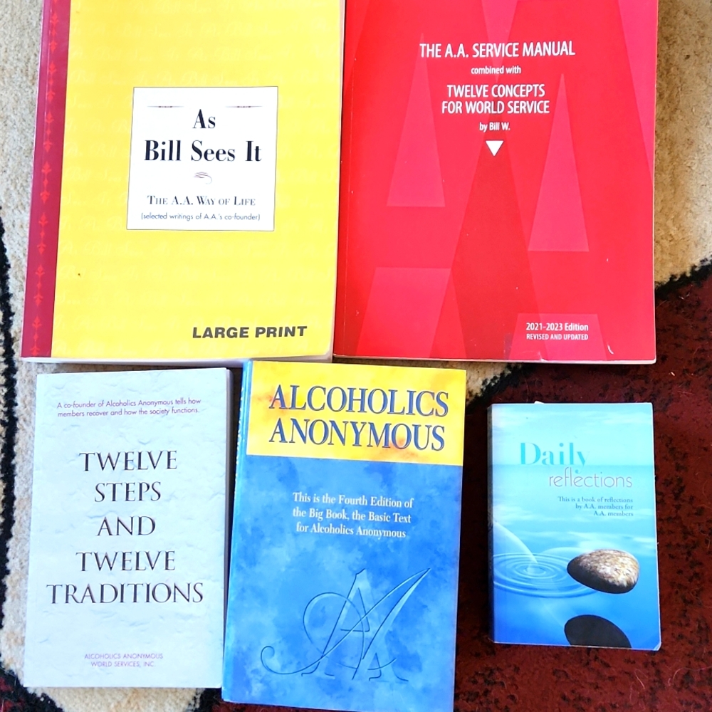 'AA' alcoholics anonymous study books and daily reflections.